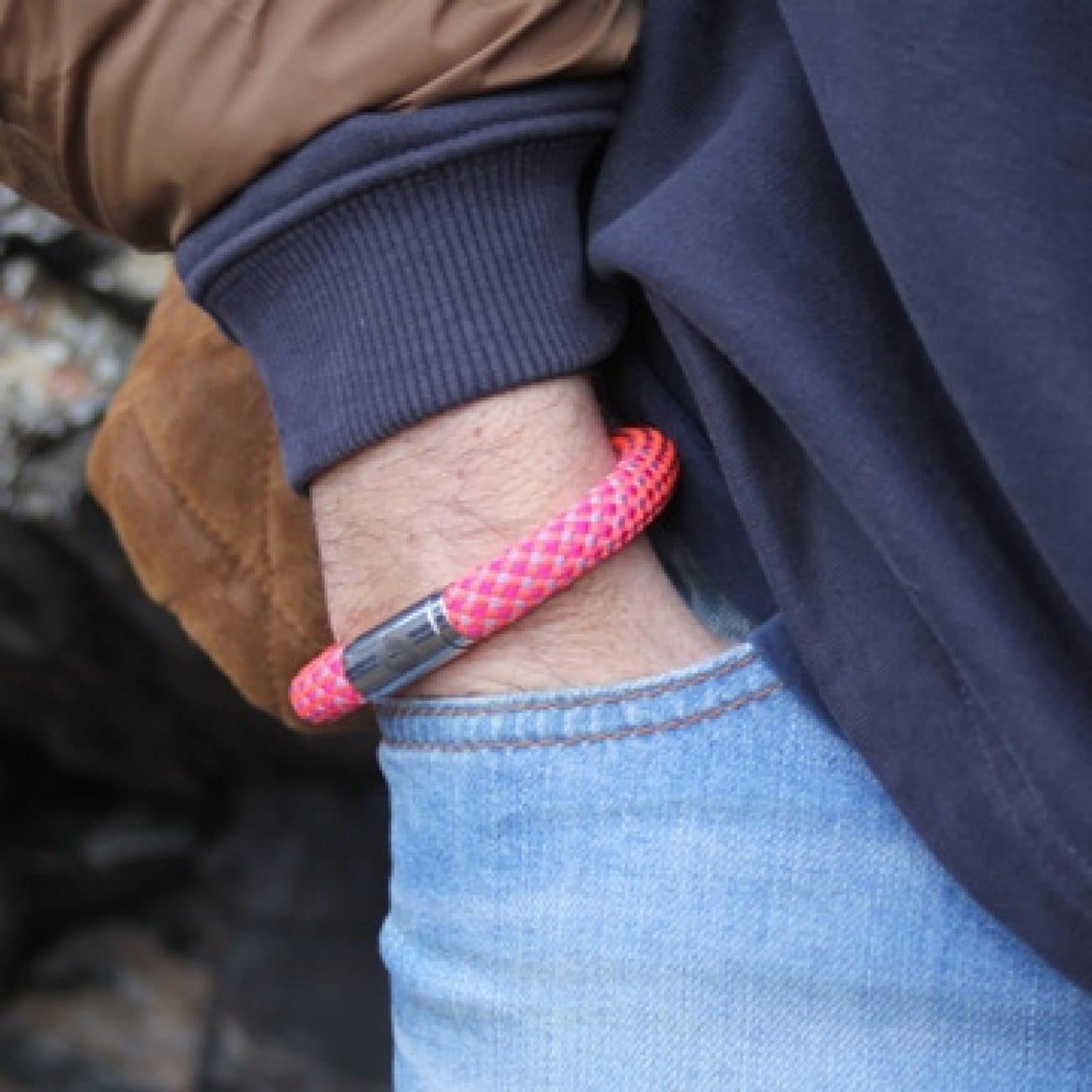 Man wearing chunky pink rope bracelet
